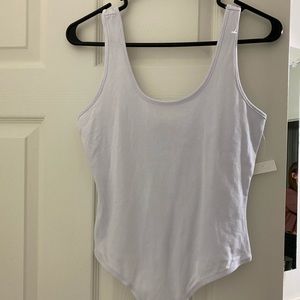 Brand new WITH tags white thong bodysuit.